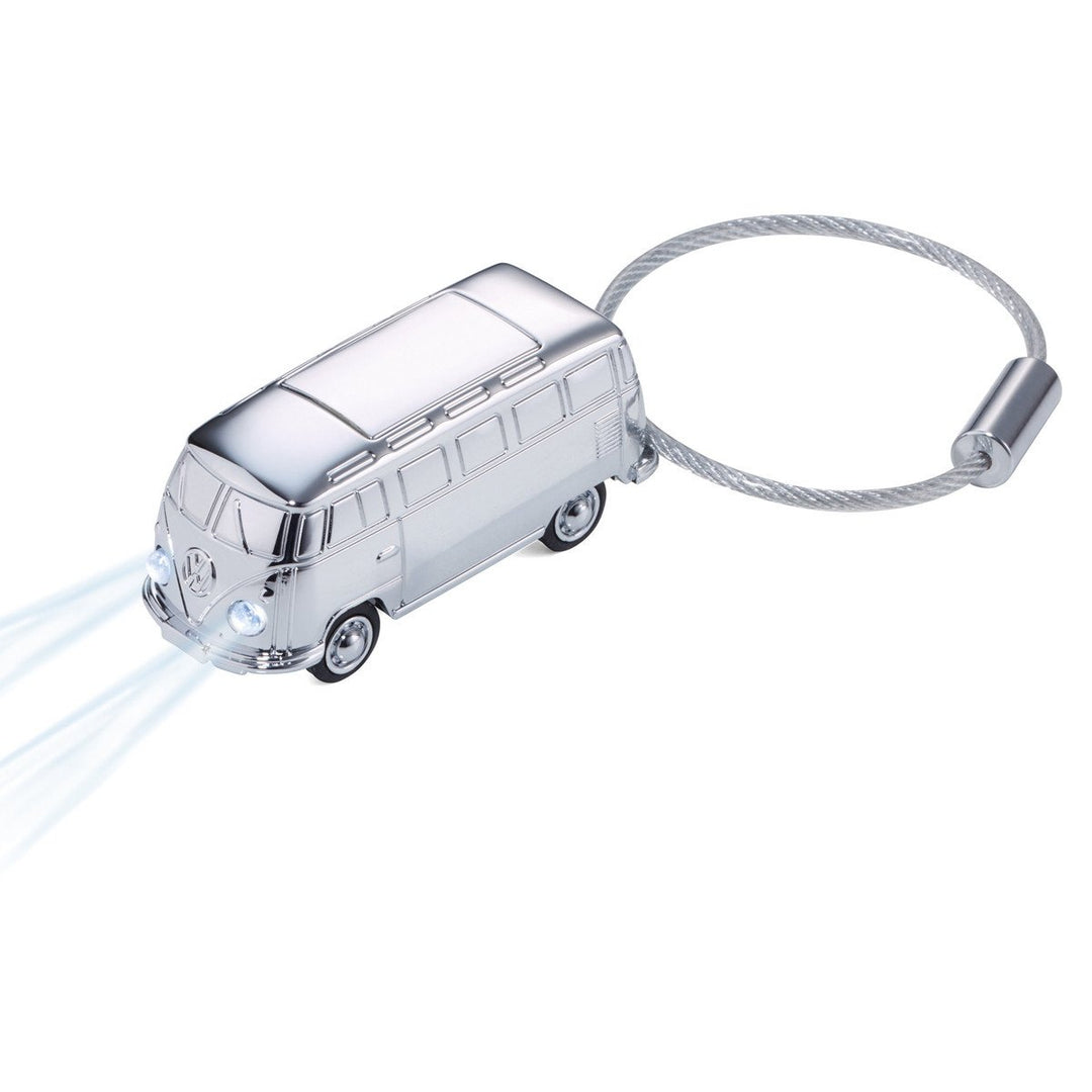 Troika VW Light Bulli, Camper Van LED Light Keychain Chrome with nail friendly wire loop. Showing white LED Lights on. Troika Item KR17-40/CH