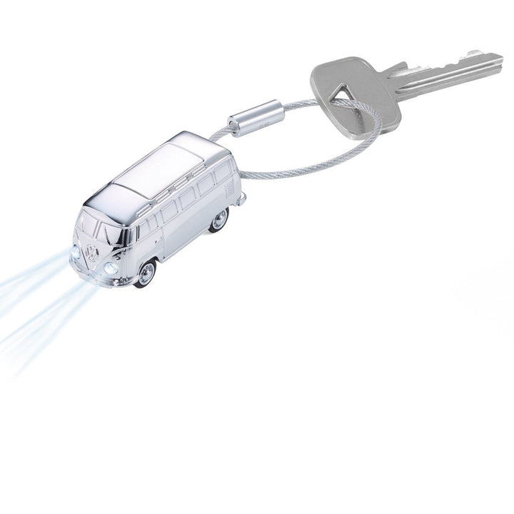 Troika VW Light Bulli, Camper Van LED Light Keychain Chrome with key on nail friendly wire loop. Showing white LED Lights on. Troika Item KR17-40/CH